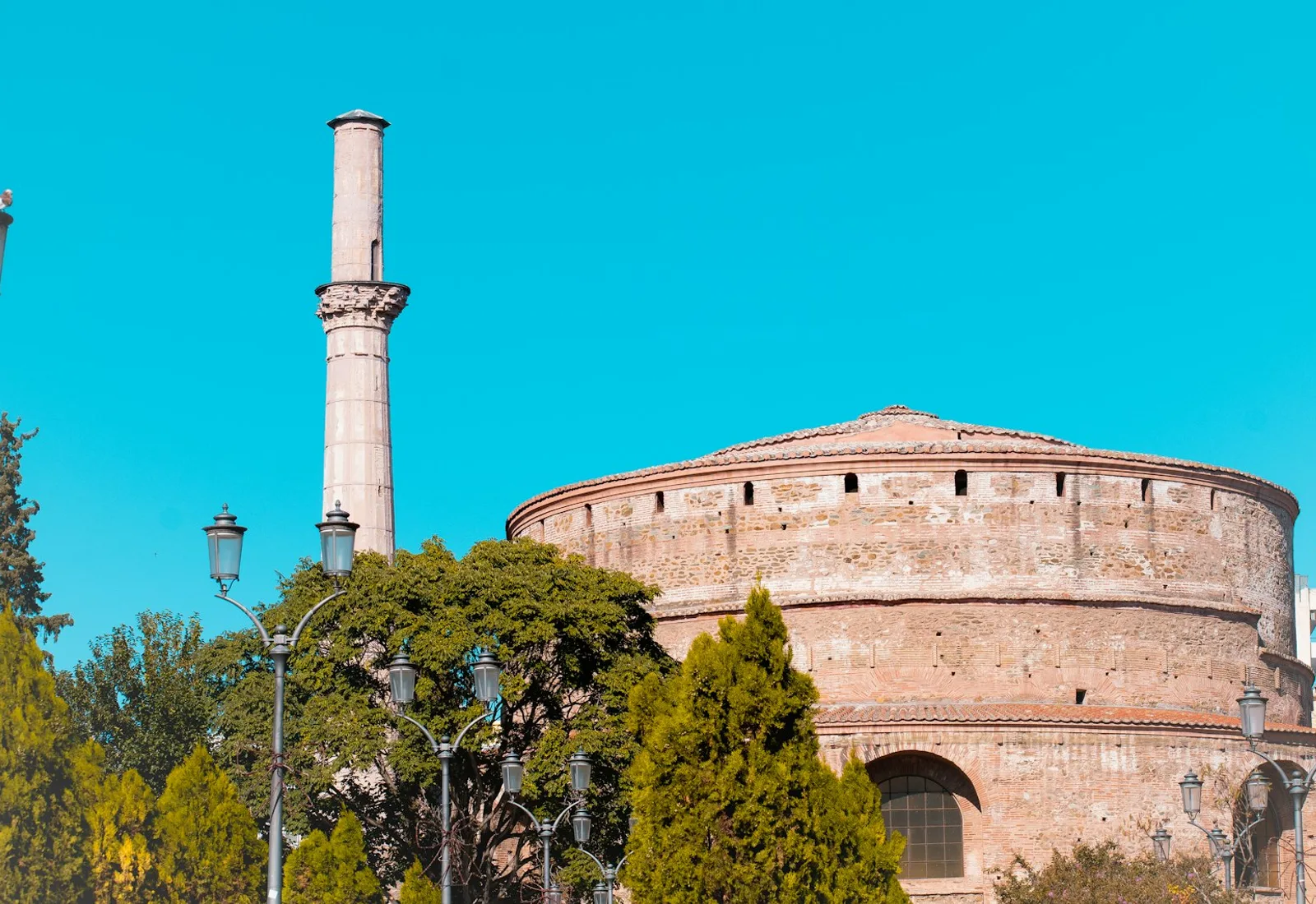 The ancient Rotunda monument under a blue sky in central Thessaloniki
