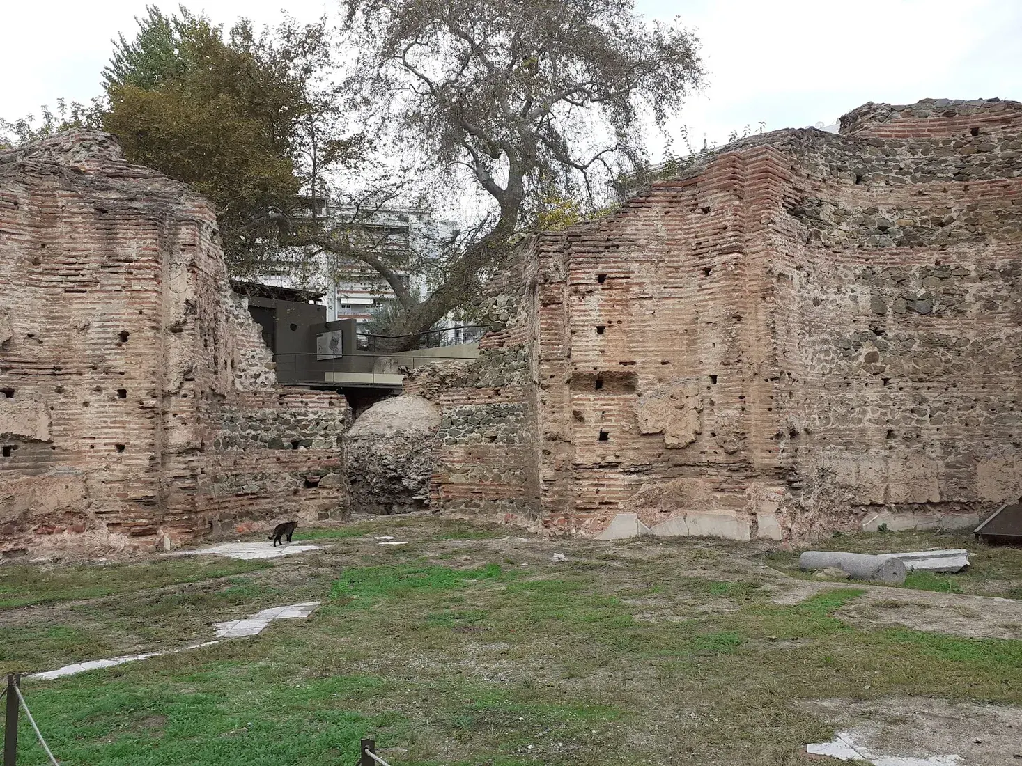 The brick-banded walls of the Palace of Galerius standing open in Navarinou Square, Thessaloniki