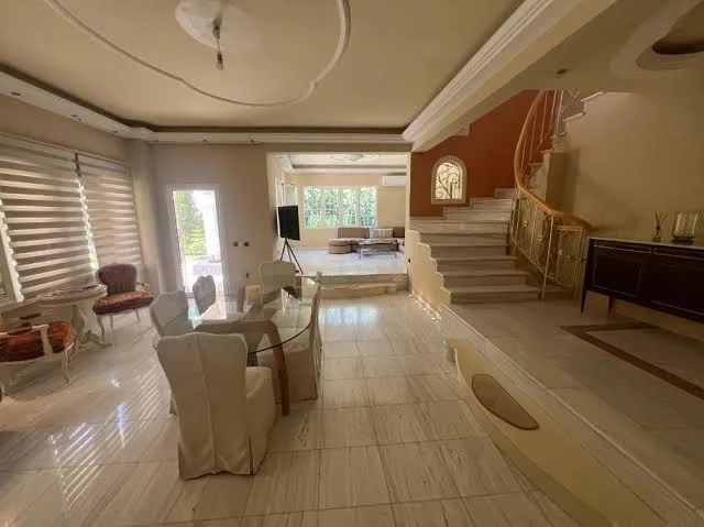 The marble living and dining area of the Panorama Hills Villa above Thessaloniki