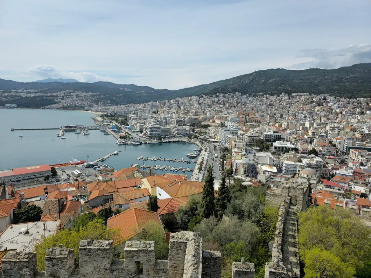 The harbour and red-roofed old town of Kavala seen from the Byzantine fortress, the bay beyond