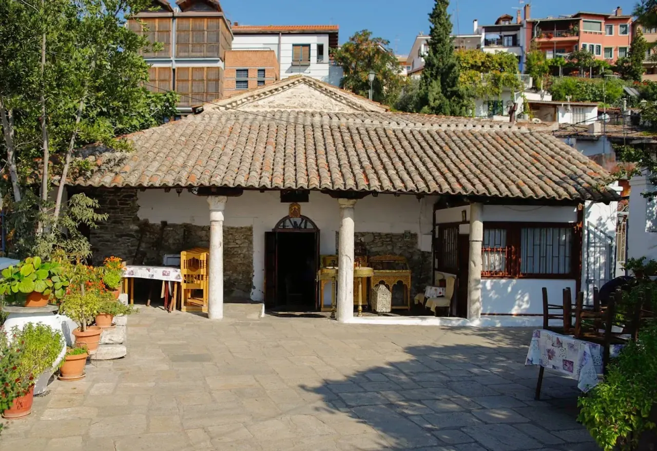 The small tile-roofed church of Osios David in its Ano Poli courtyard, Thessaloniki