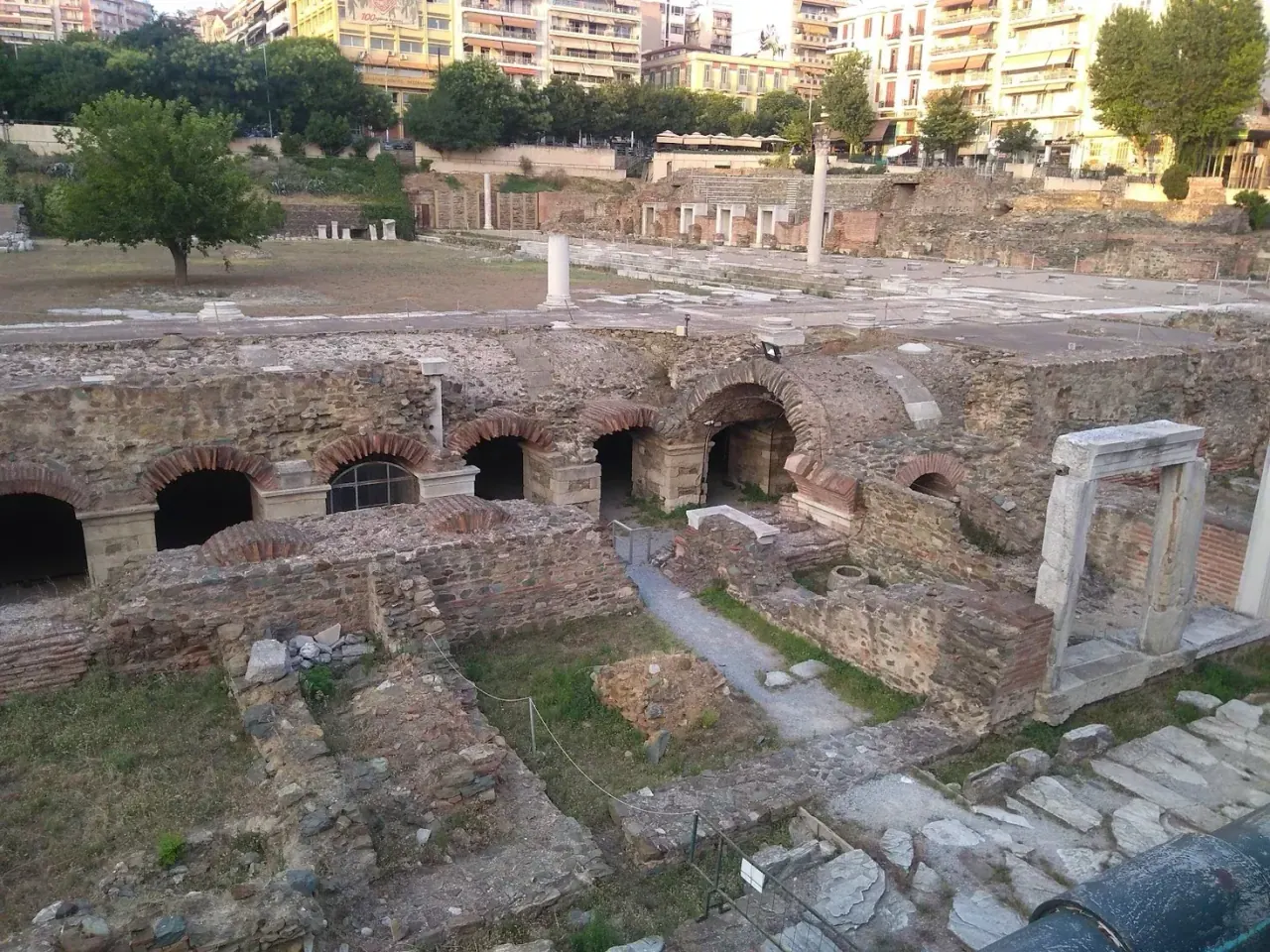 The excavated Roman Forum of Thessaloniki, its restored odeon and colonnades below the modern city