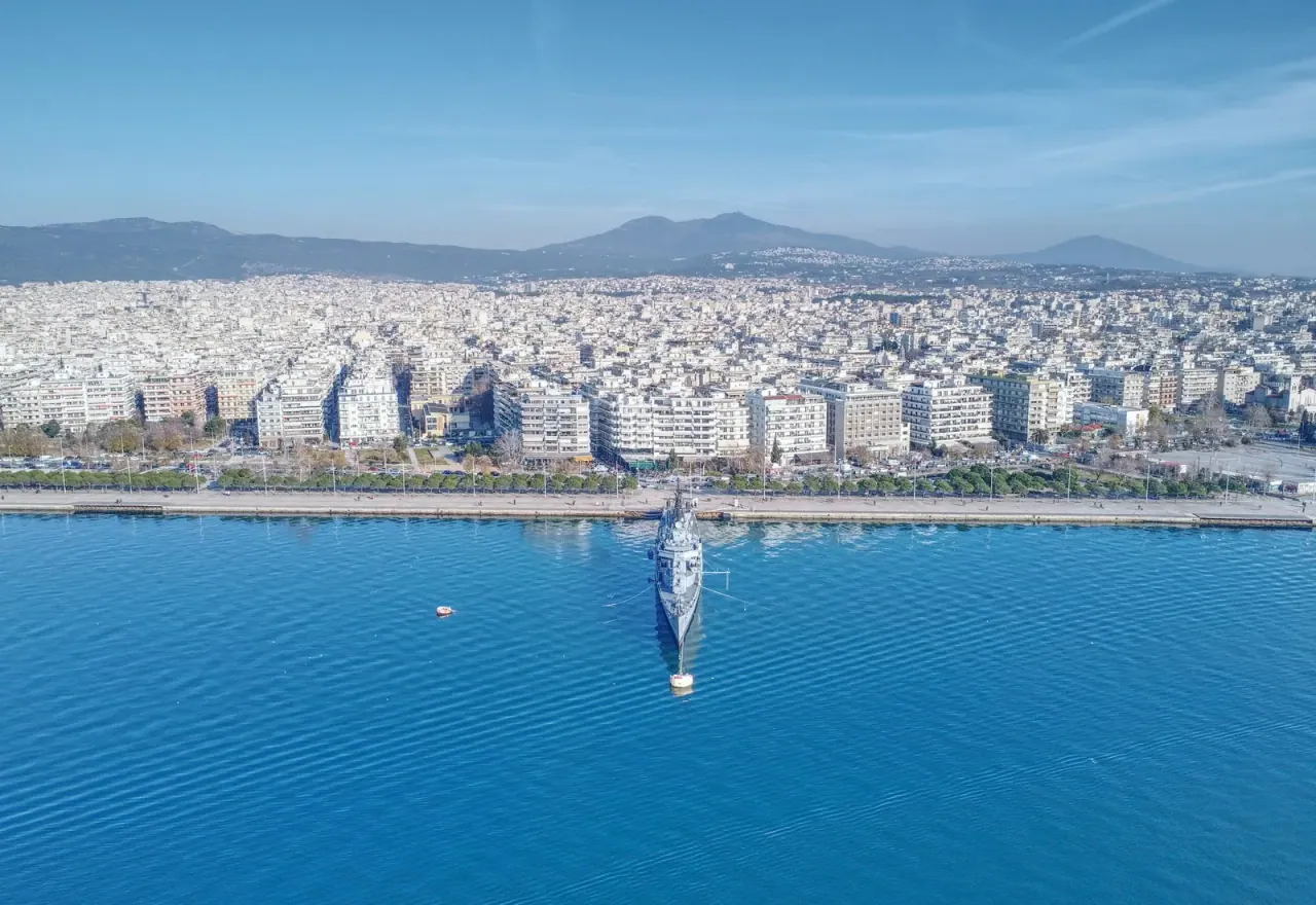 Aerial view of the Thessaloniki waterfront and the Thermaic Gulf under a clear spring sky