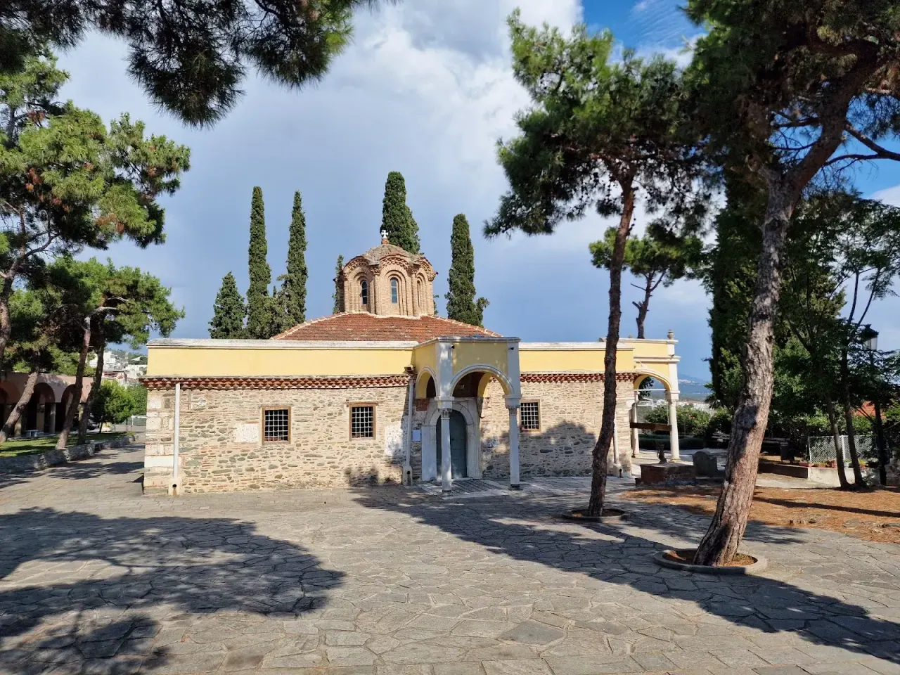 The domed 14th-century katholikon of Vlatadon Monastery in its garden courtyard, Ano Poli, Thessaloniki