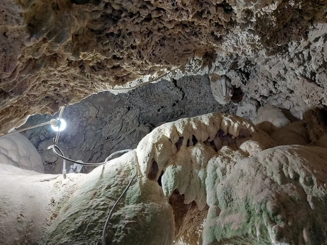 The cave grotto behind the Karanos waterfall at Edessa, looking out through the rock
