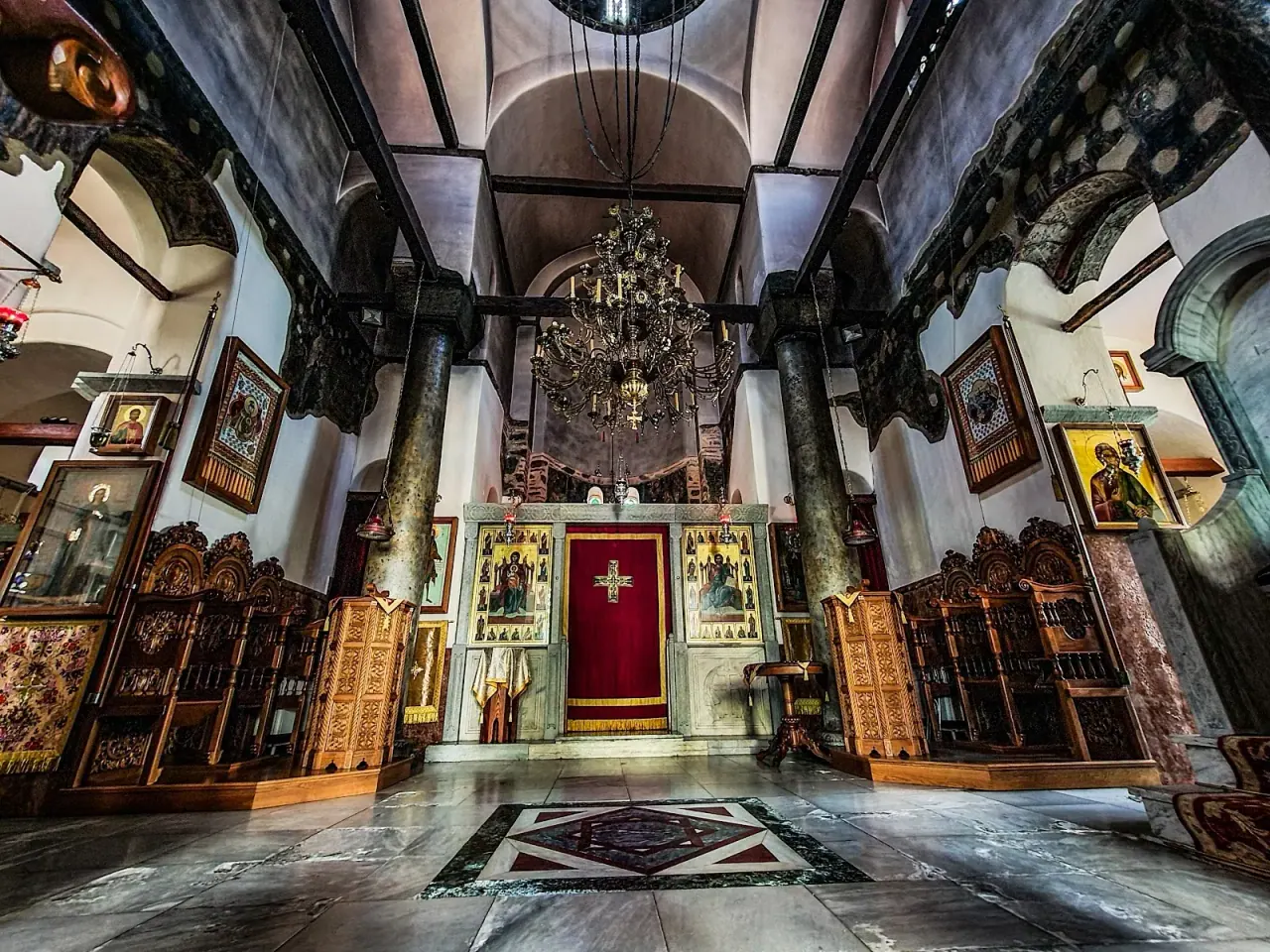 The interior of Agia Aikaterini looking toward the icon screen between its marble columns, Thessaloniki