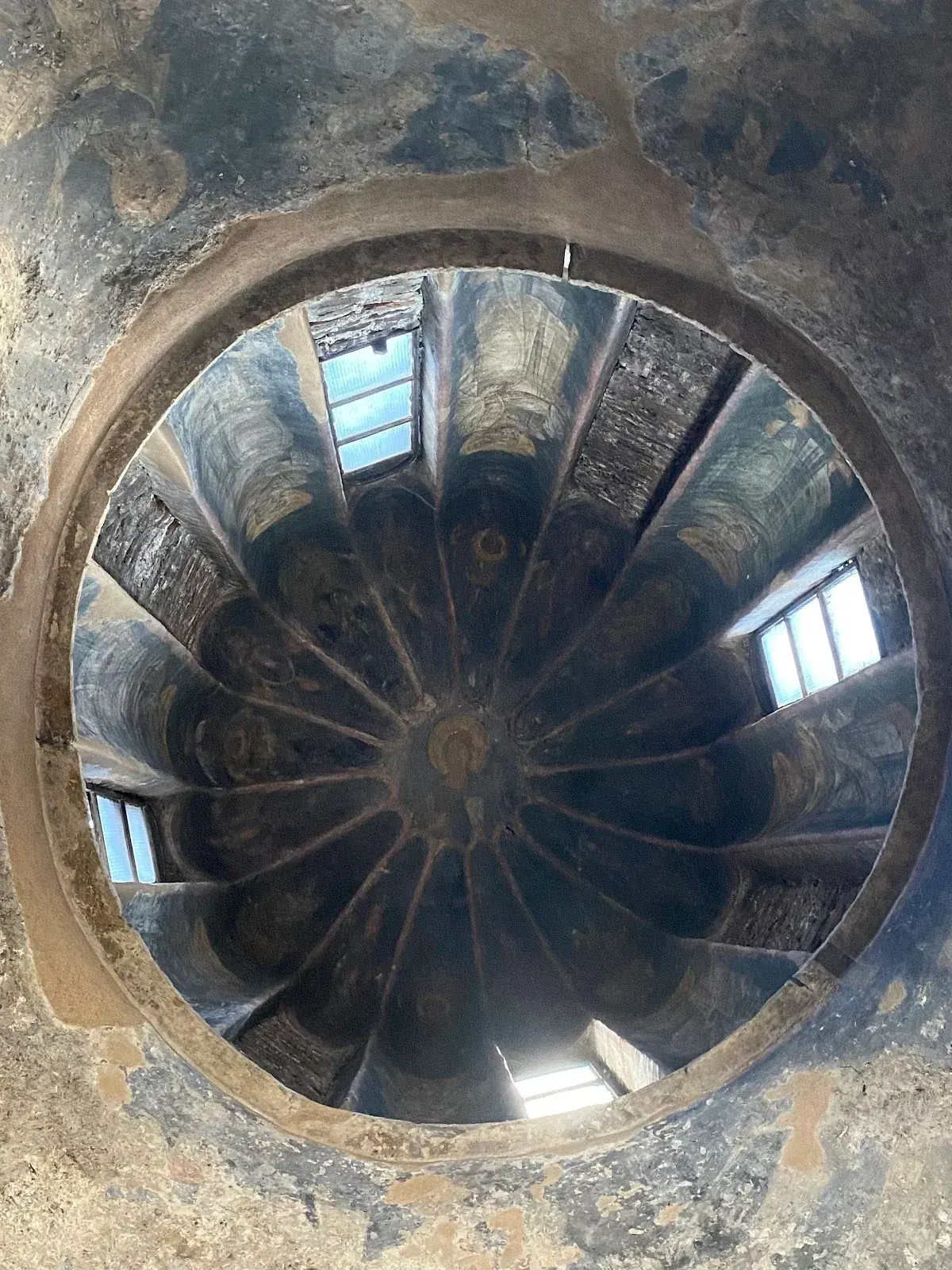 Looking up into the central brick dome of the Church of the Holy Apostles, Thessaloniki