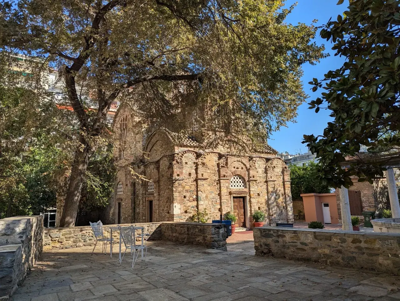 Agios Panteleimon church in its leafy courtyard near the Arch of Galerius, Thessaloniki