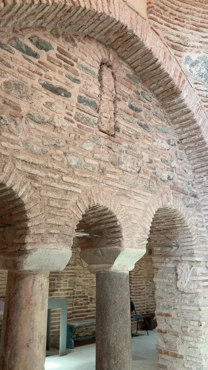 The brick arches and columns inside the Byzantine Bath of Thessaloniki