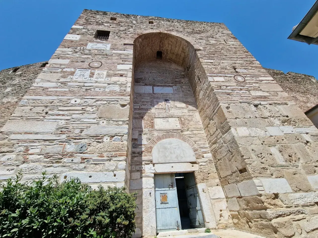 The monumental main gate of the Heptapyrgion fortress with its carved marble inscription