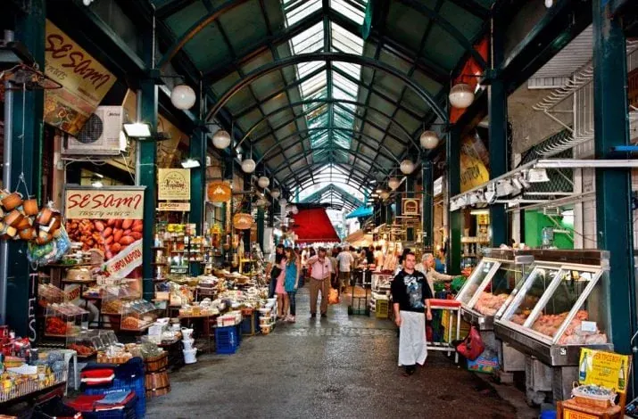 The iron-and-glass roofed arcade of Kapani Market lined with delis, grocers and spice stalls, Thessaloniki