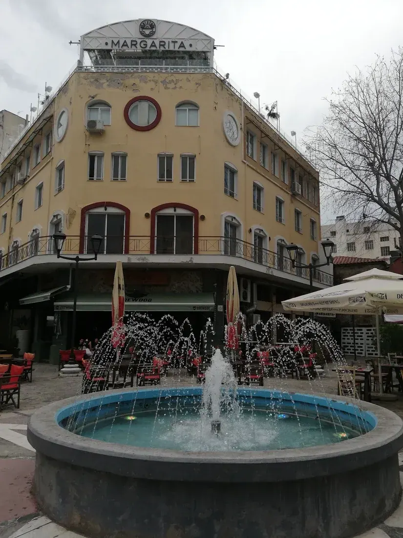 A fountain square lined with tavernas in the Ladadika district of Thessaloniki