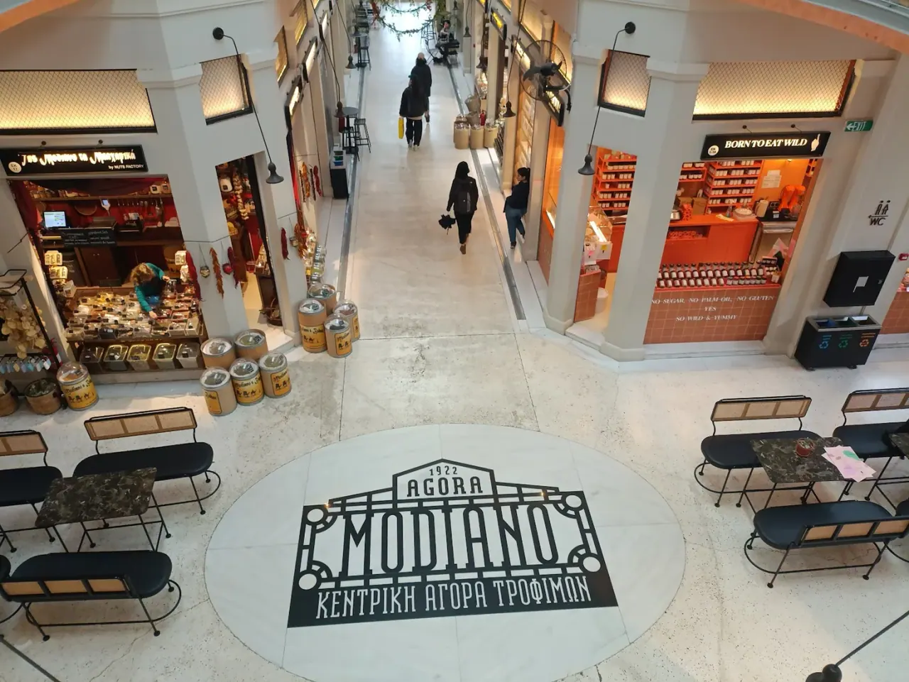 Elevated view of the Modiano Market hall with its 1922 floor inlay and stalls on either side