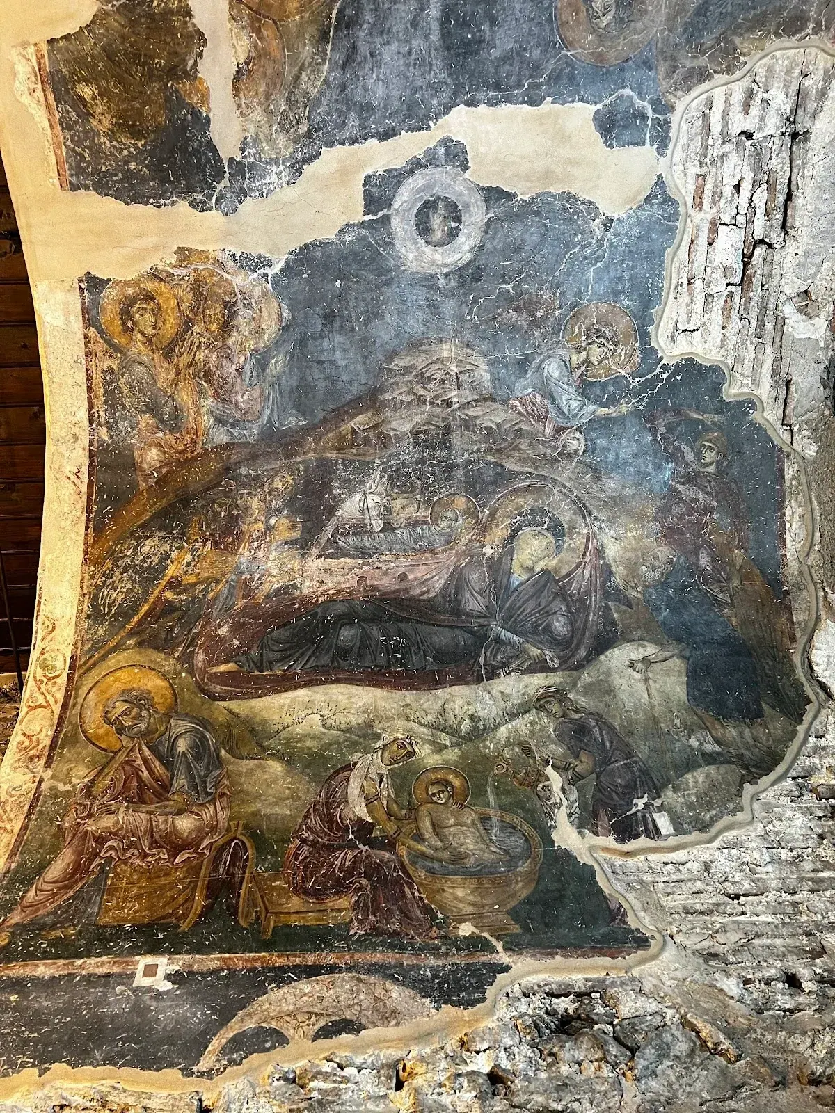 Faded Byzantine wall frescoes inside the church of Osios David, Thessaloniki