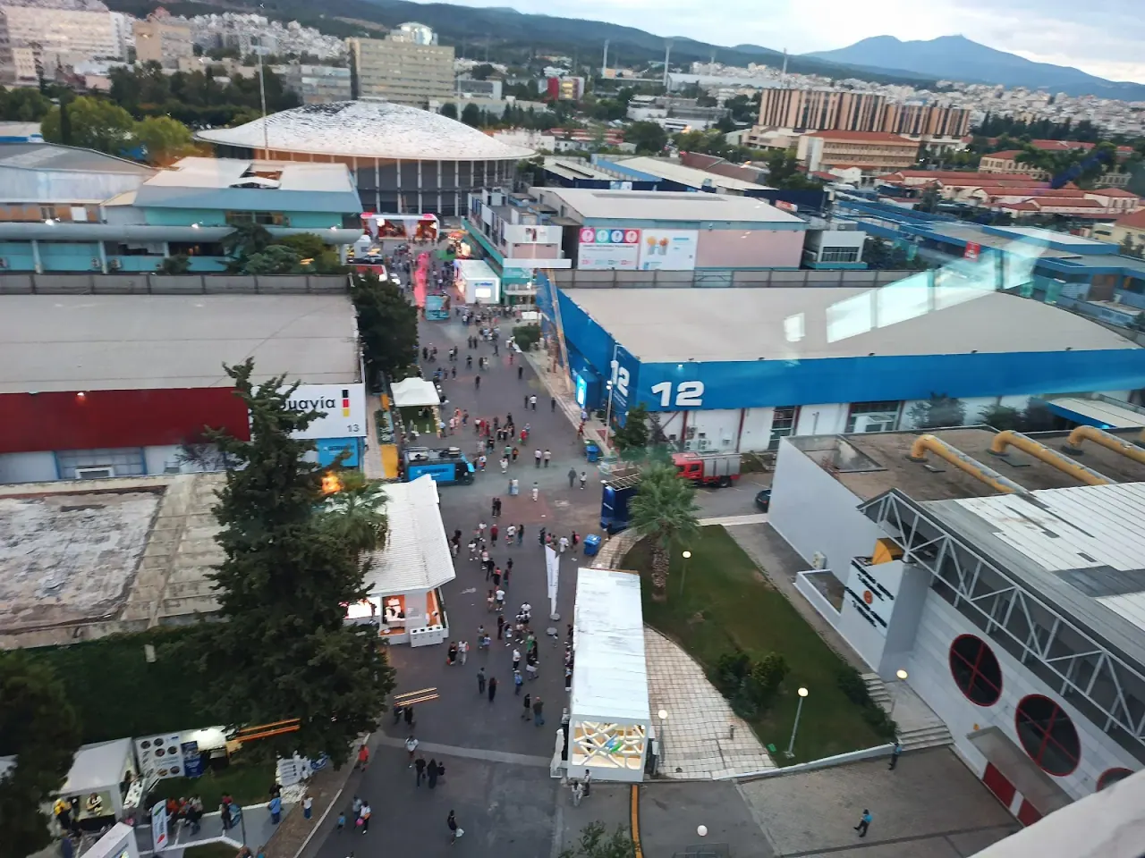 Looking down from the OTE Tower over the international fairgrounds and the city sprawl toward the hills, Thessaloniki