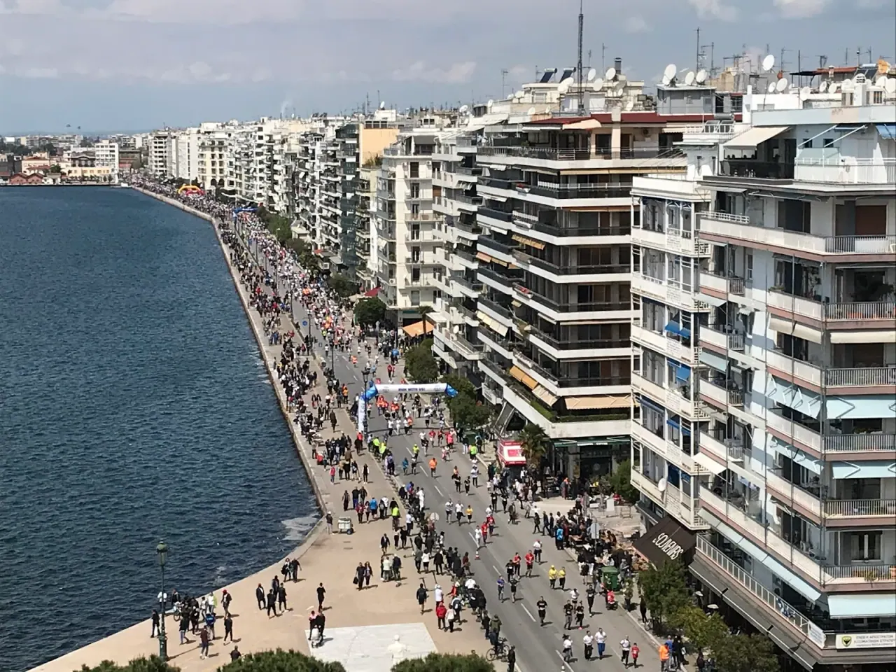 The view from the top of the White Tower along the curving Thessaloniki seafront promenade and the Thermaic Gulf