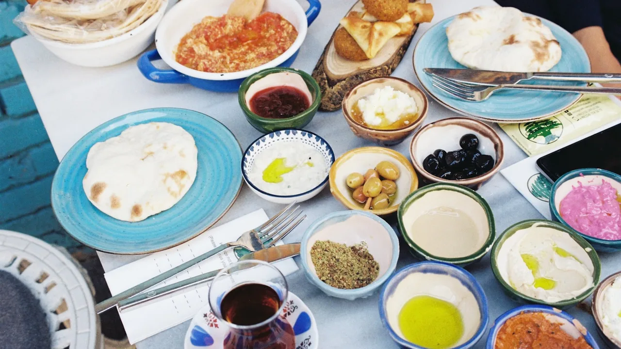 A spread of traditional Greek dishes on a table in Thessaloniki