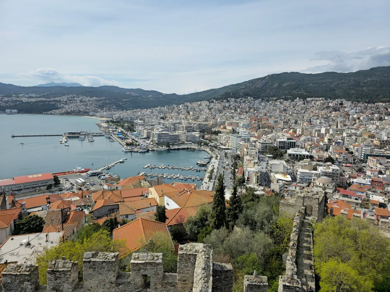 The harbour and red-roofed old town of Kavala seen from the Byzantine fortress, the bay beyond