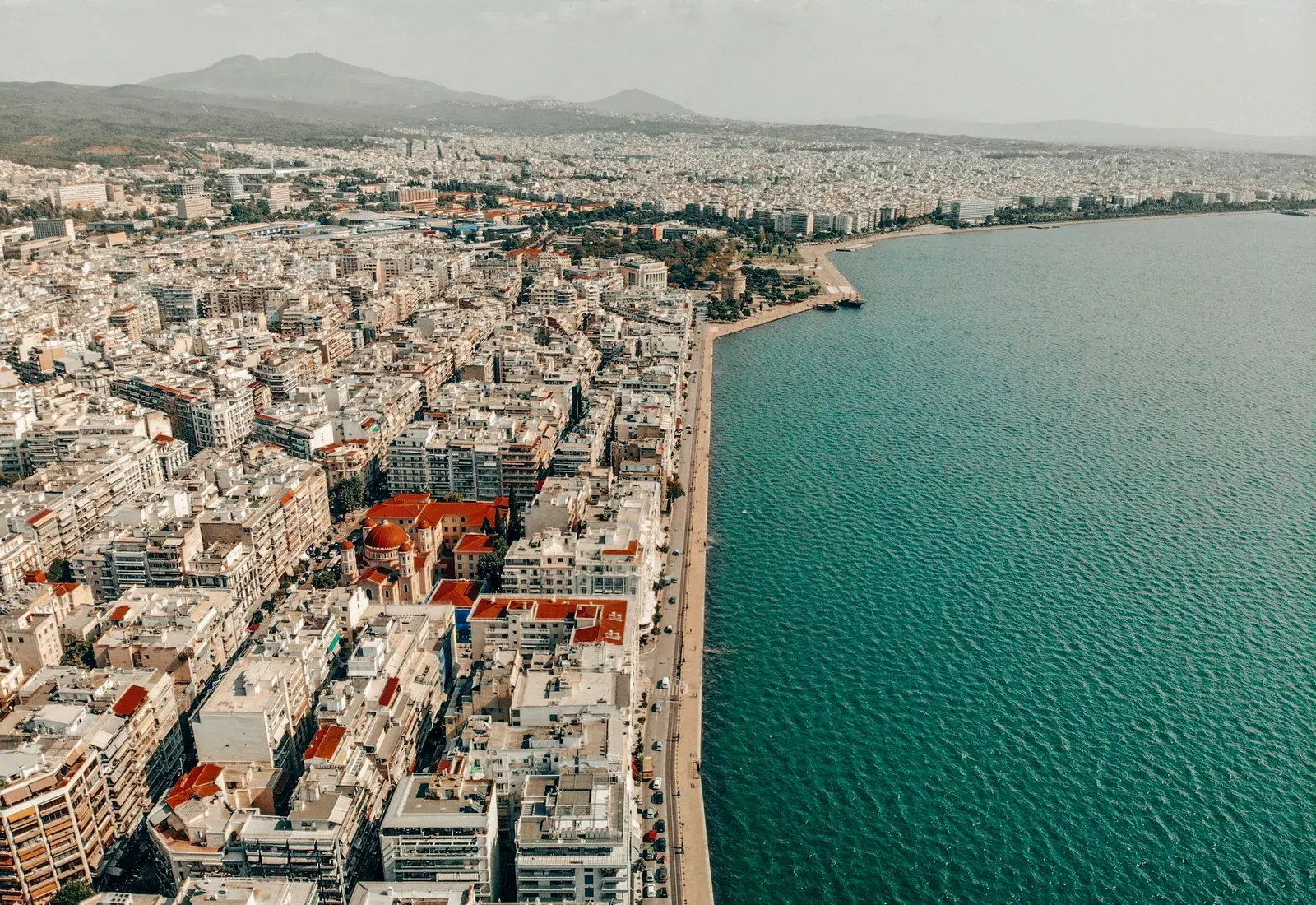 Aerial view of Thessaloniki along the Thermaic Gulf, with the White Tower and the seafront