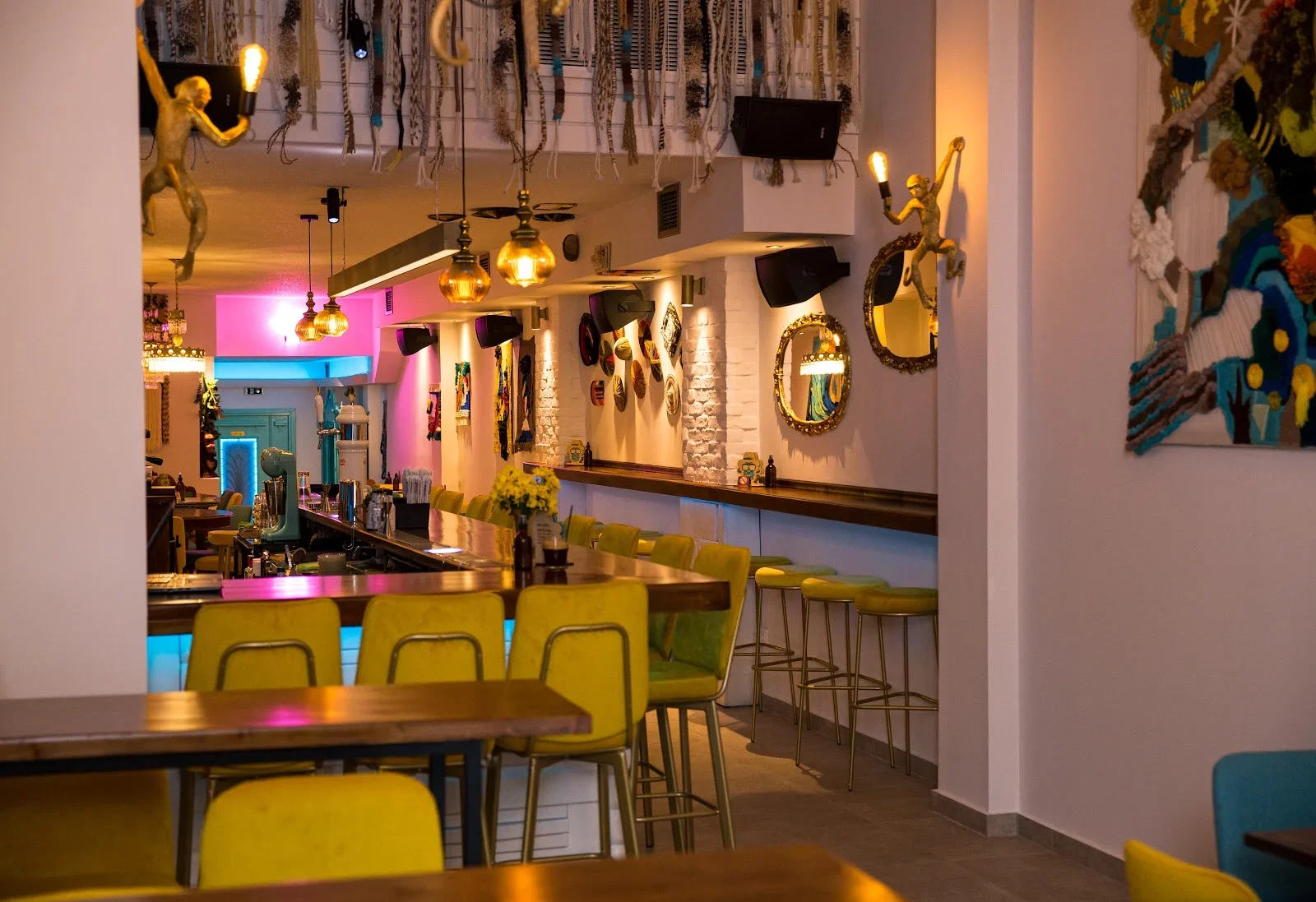 The colourful, art-filled interior of Funky Monkey all-day cocktail and coffee bar near Navarinou, Thessaloniki