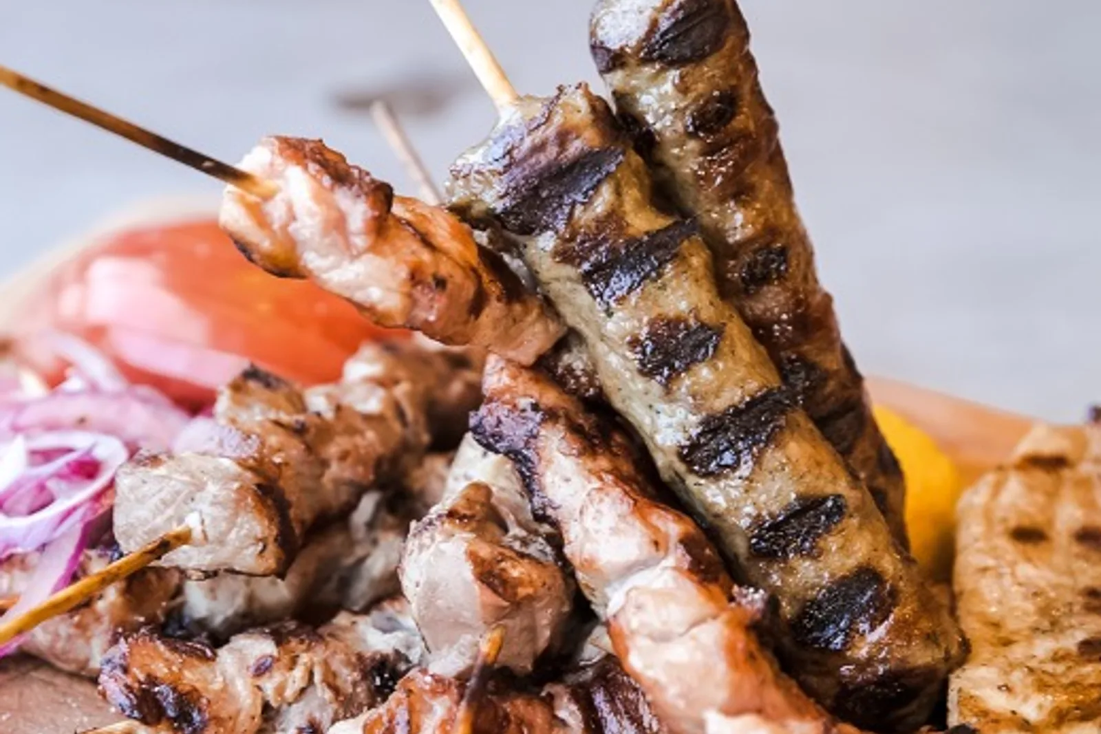 Charcoal-grilled souvlaki skewers at Derlicatessen, Thessaloniki