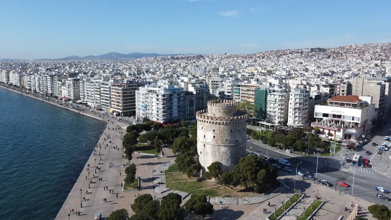 Aerial view of Thessaloniki's waterfront and the White Tower with the city stretching to the hills