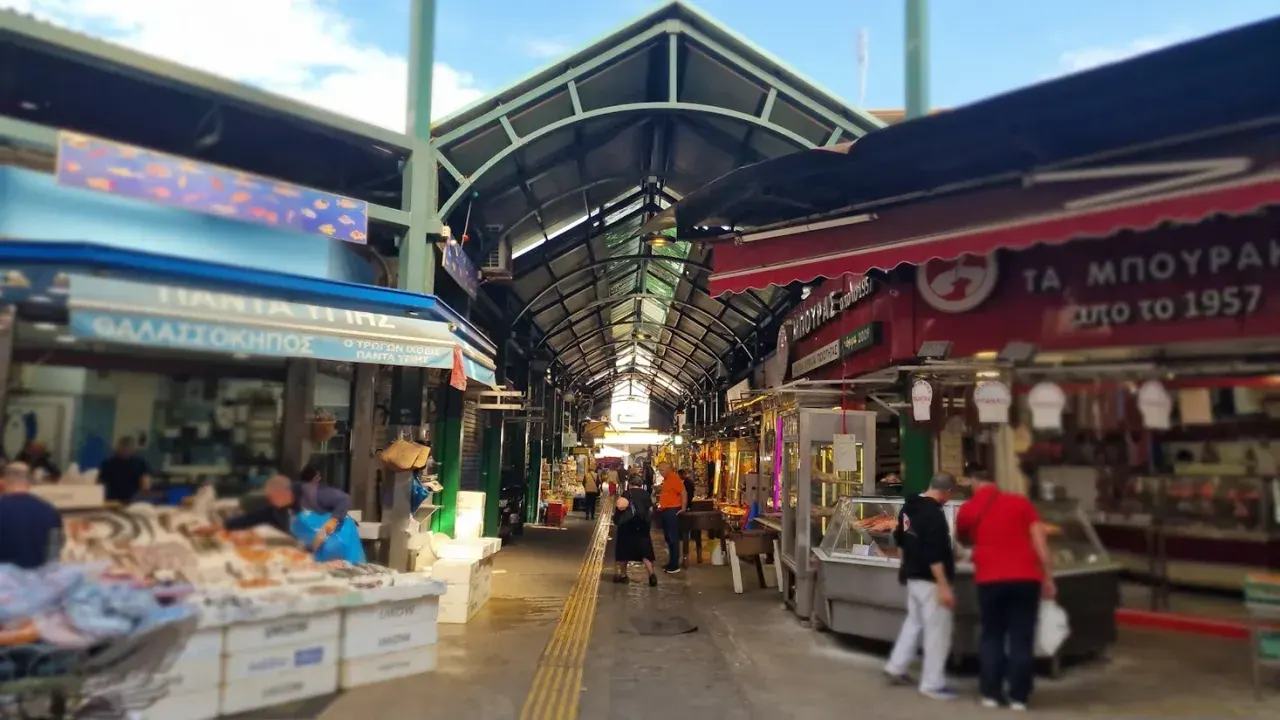 Stalls of the bustling Kapani open-air market in Thessaloniki, a cheap place to eat